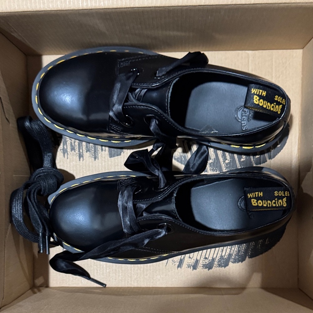 Dr. Martens Black Leather Shoes with Yellow Accents